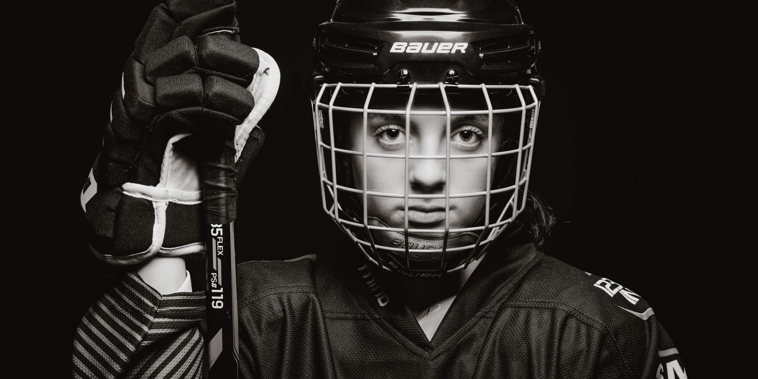 Studio portrait of a teenage ice hockey player
