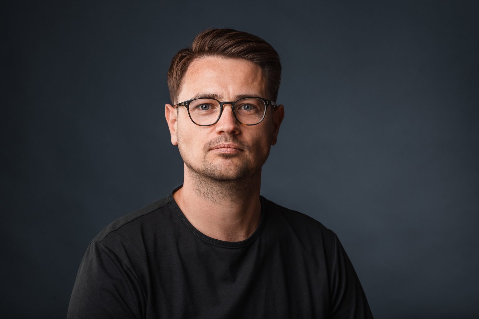 Studio headshot of a man